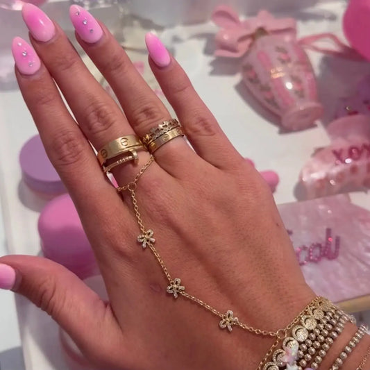 Gilded Bow Hand Chain EVRY JEWELS